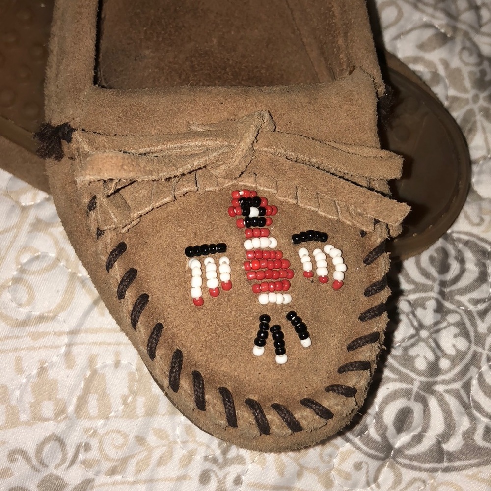 Woman’s Minnetonka real leather moccasins
